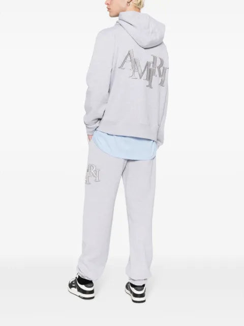 AMIRI Staggered logo-embroidered cotton hoodie