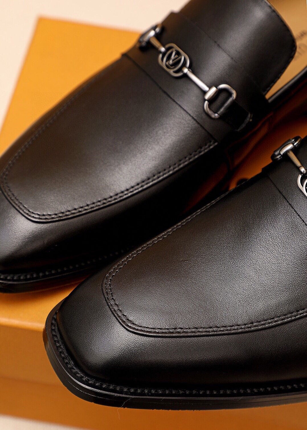 Louis Vuitton Black Metal-Bit Leather Loafers